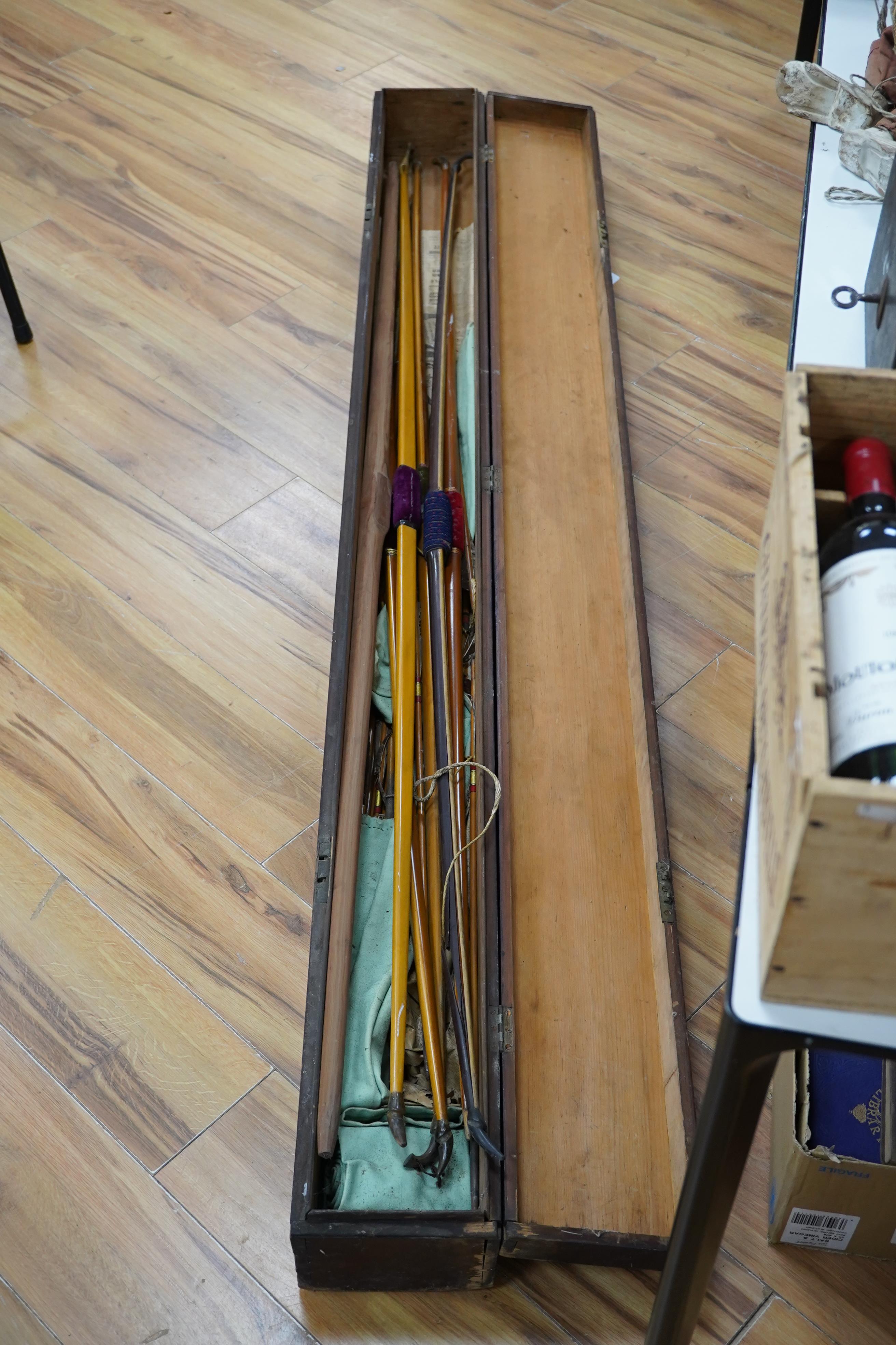 Five Victorian and later archery longbows, a blank for a longbow, and a selection of arrows, boxed. Condition - poor to good.